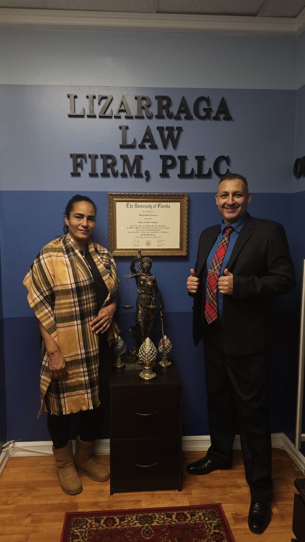 Teresa Santos with William R. Lizárraga at the firm's office