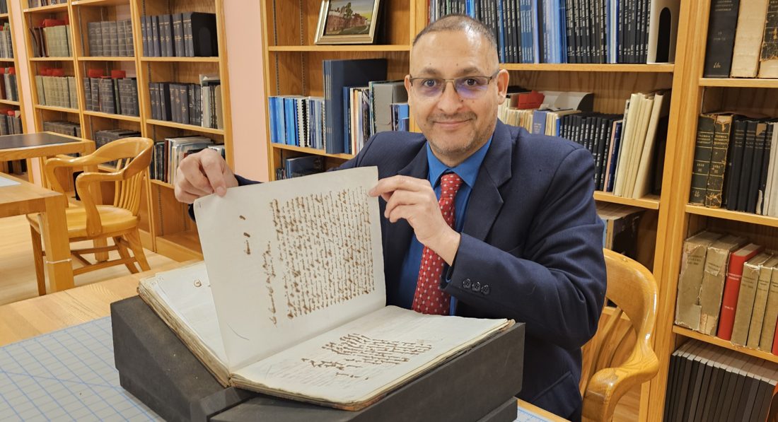 William R. Lizárraga, Esq. reviewing historical documents in the Columbia University archives