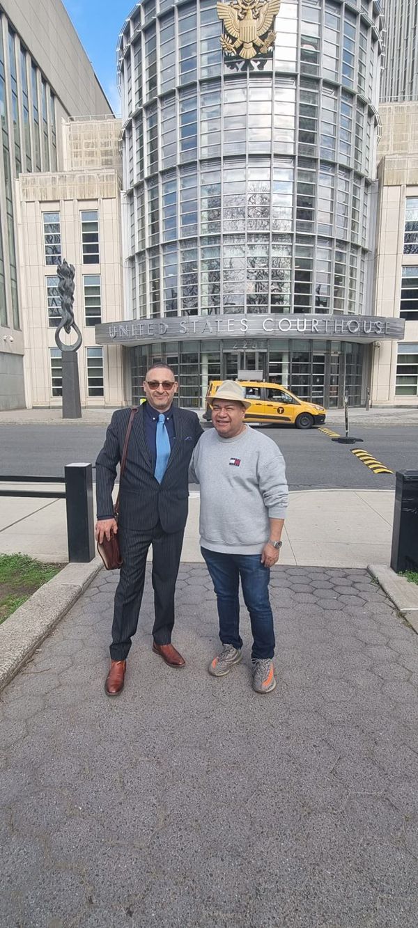 Nelson Bermeo with William R. Lizárraga outside the federal courthouse